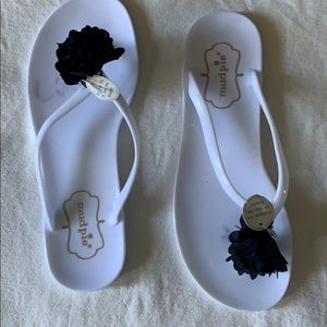 Brand new mud pie flip flops.
